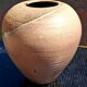 Glazed stoneware vase with a contemporary design, signed to be identified.
