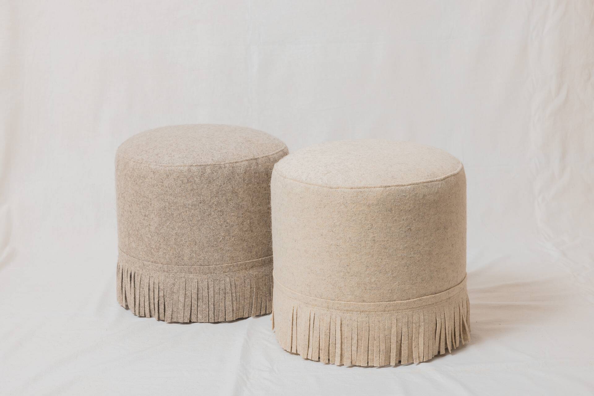 Pair of wool poufs