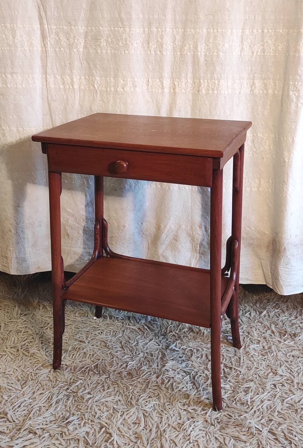 Curved solid wood side table - early 20th century