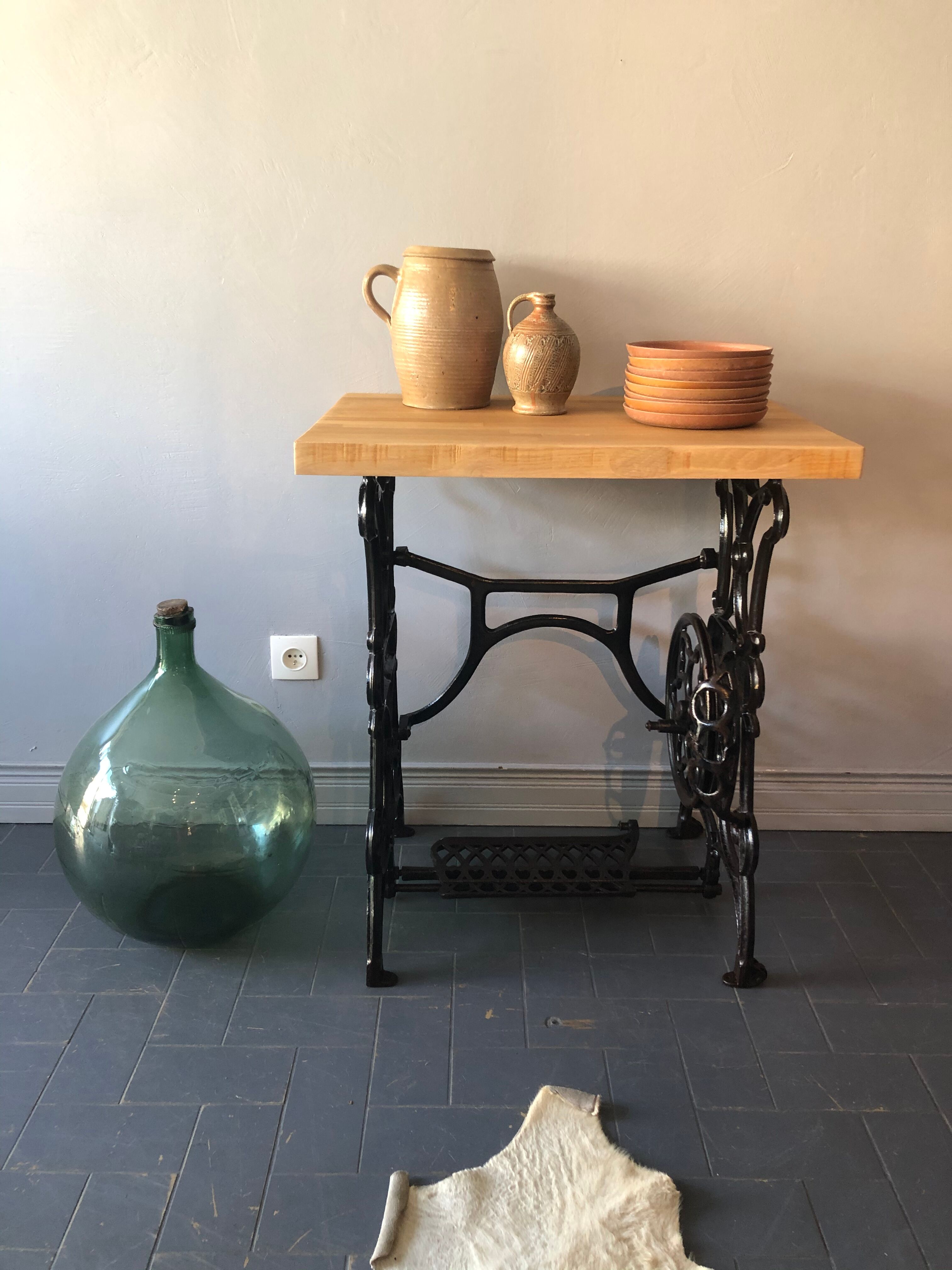 Ancient table, cast iron footing