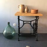 Ancient table, cast iron footing