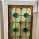 4 vintage faux stained glass panels that can form a screen or a partition