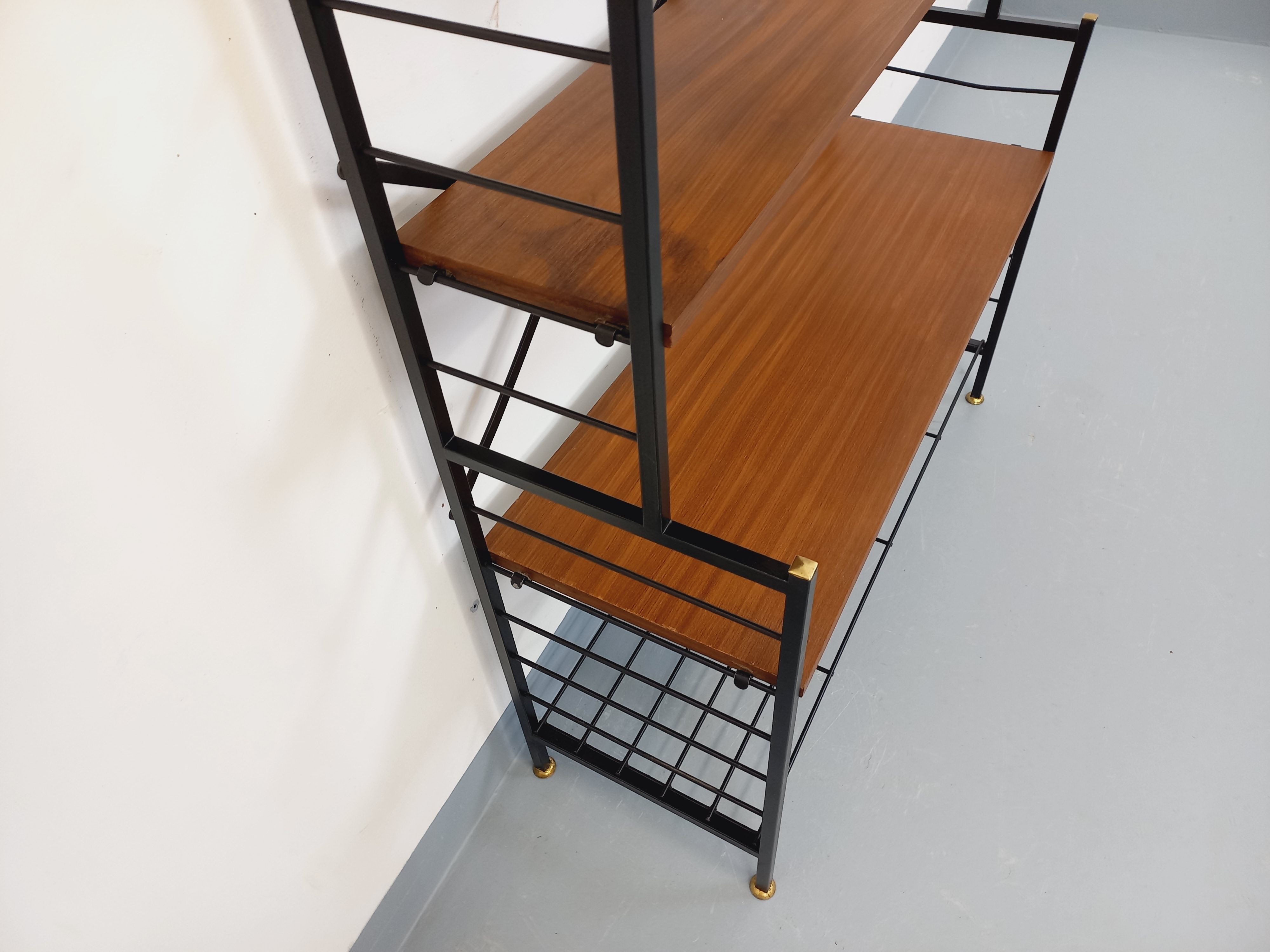 Vintage Italian bookshelf in teak and metal from the 1960s.