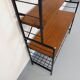 Vintage Italian bookshelf in teak and metal from the 1960s.