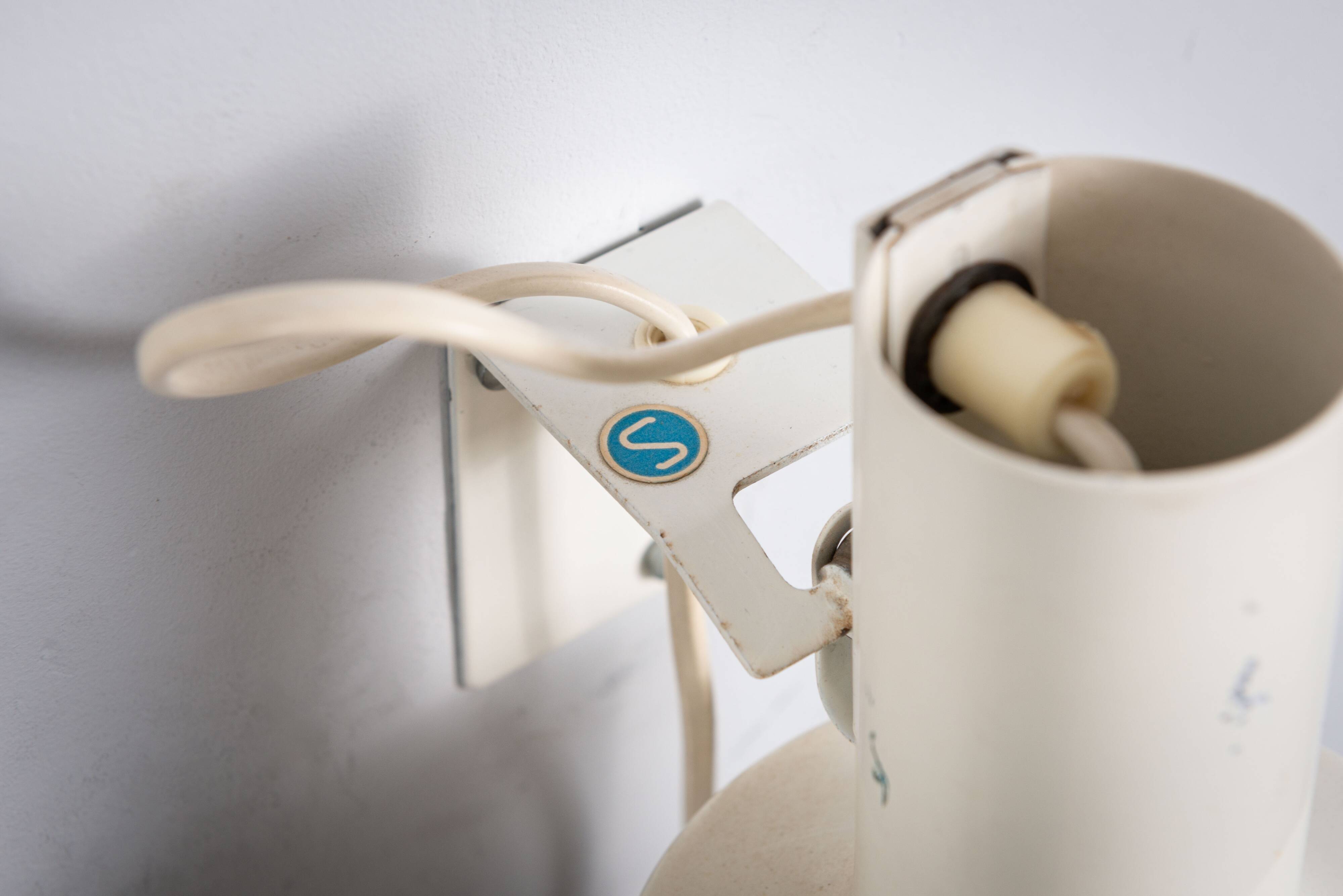 Pair of adjustable wall lamps designed by Per Sundstedt for Kosta Lampan