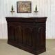 Early 20th-century oak bar counter with period zinc and tin cladding.