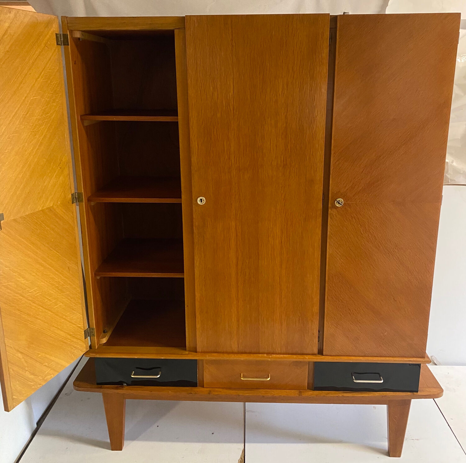 Vintage wardrobe with compass feet from the 60s