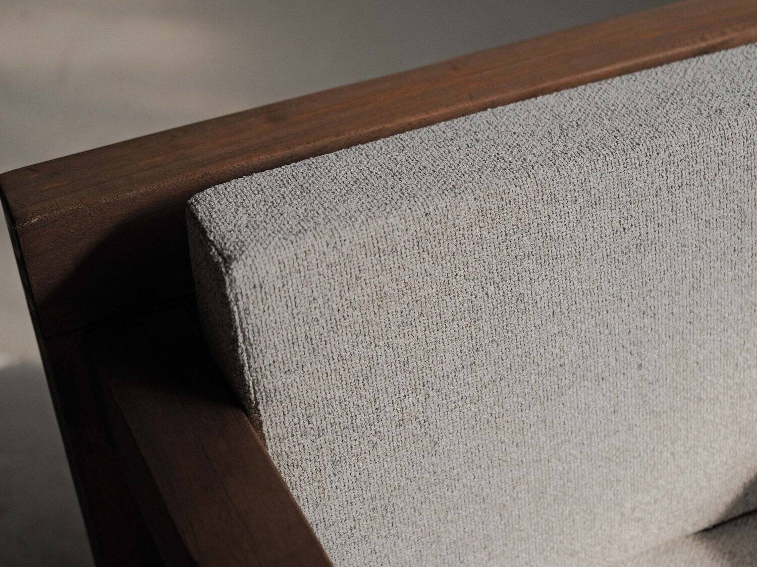 Handcrafted armchair in solid wood and fabric, 1980s-90s.