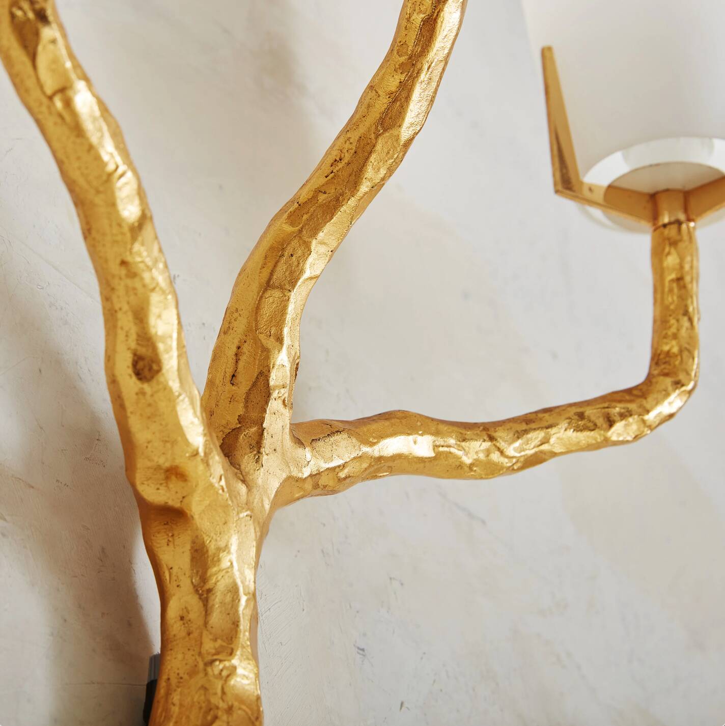 Pair of wall lights by Maison Arlus by Felix Agostini in bronze.