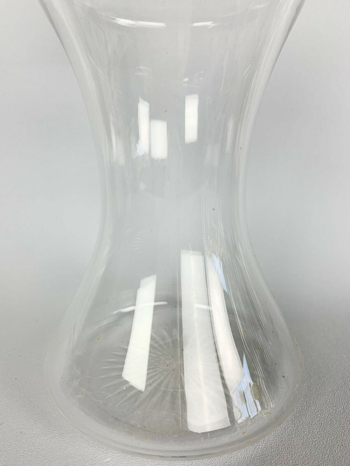 Blown glass carafe with silver frame and cap