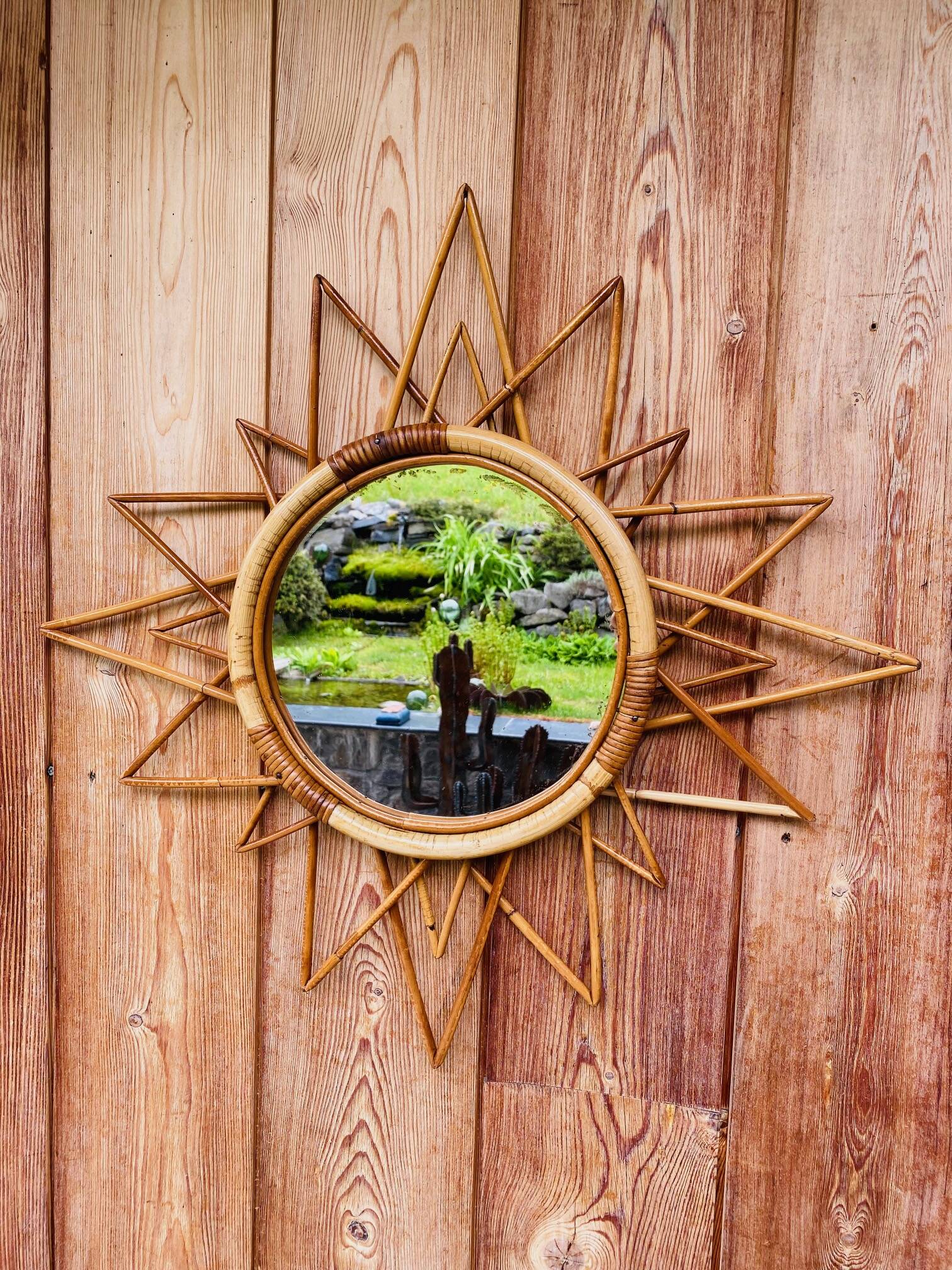 Vintage 60s/70s rattan sun mirror.