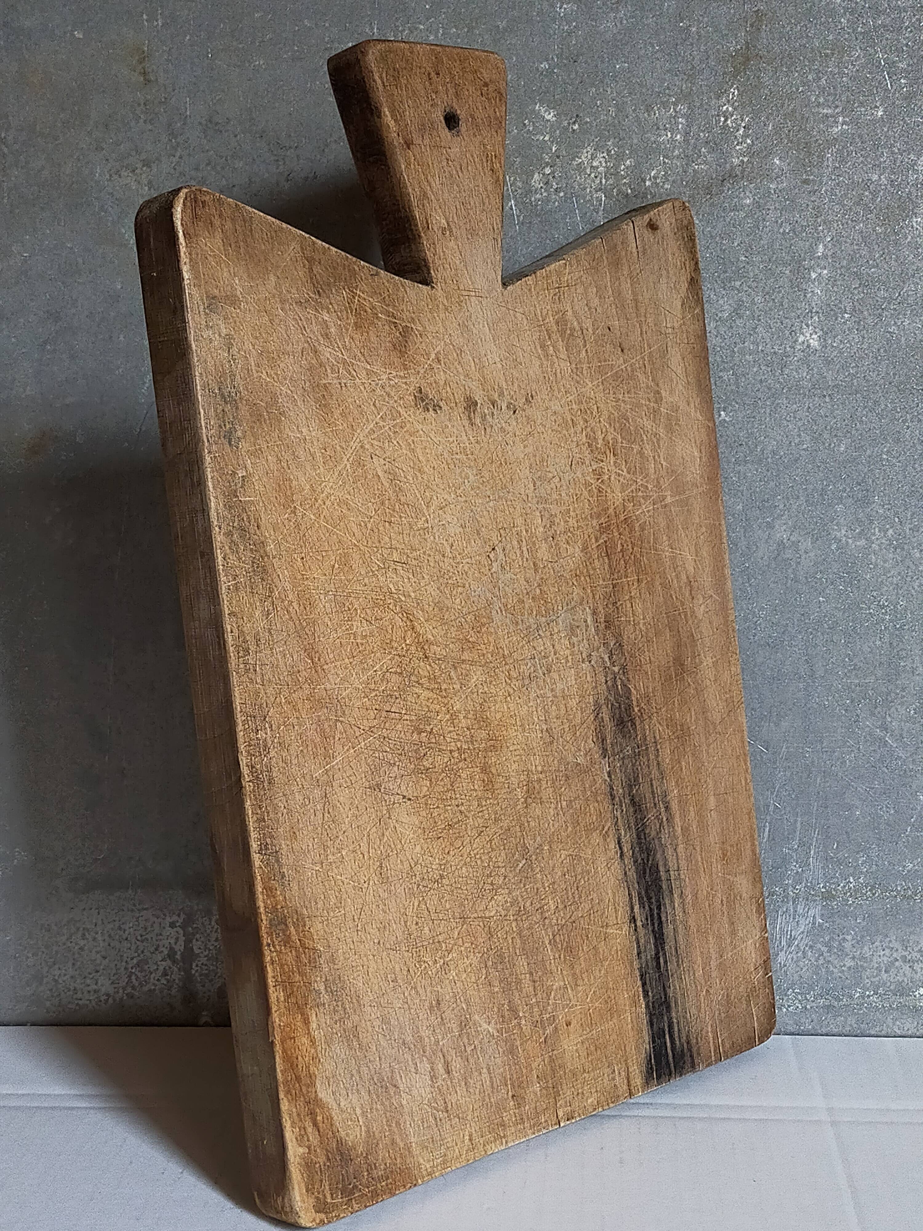 Cutting board in old solid wood