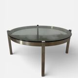 Vintage round coffee table with smoked glass and chrome.