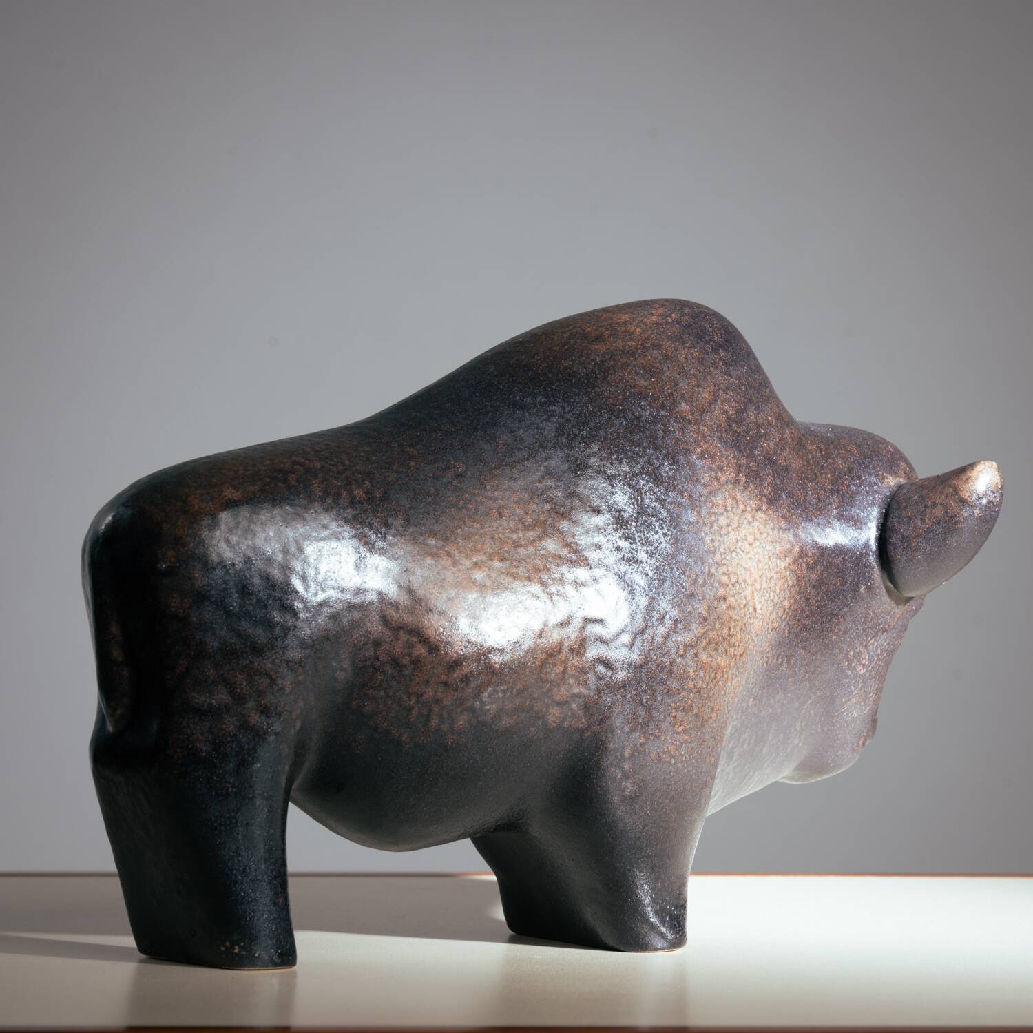 Brown glazed bull sculpture by Ed Ruscha, 1970s ceramic art