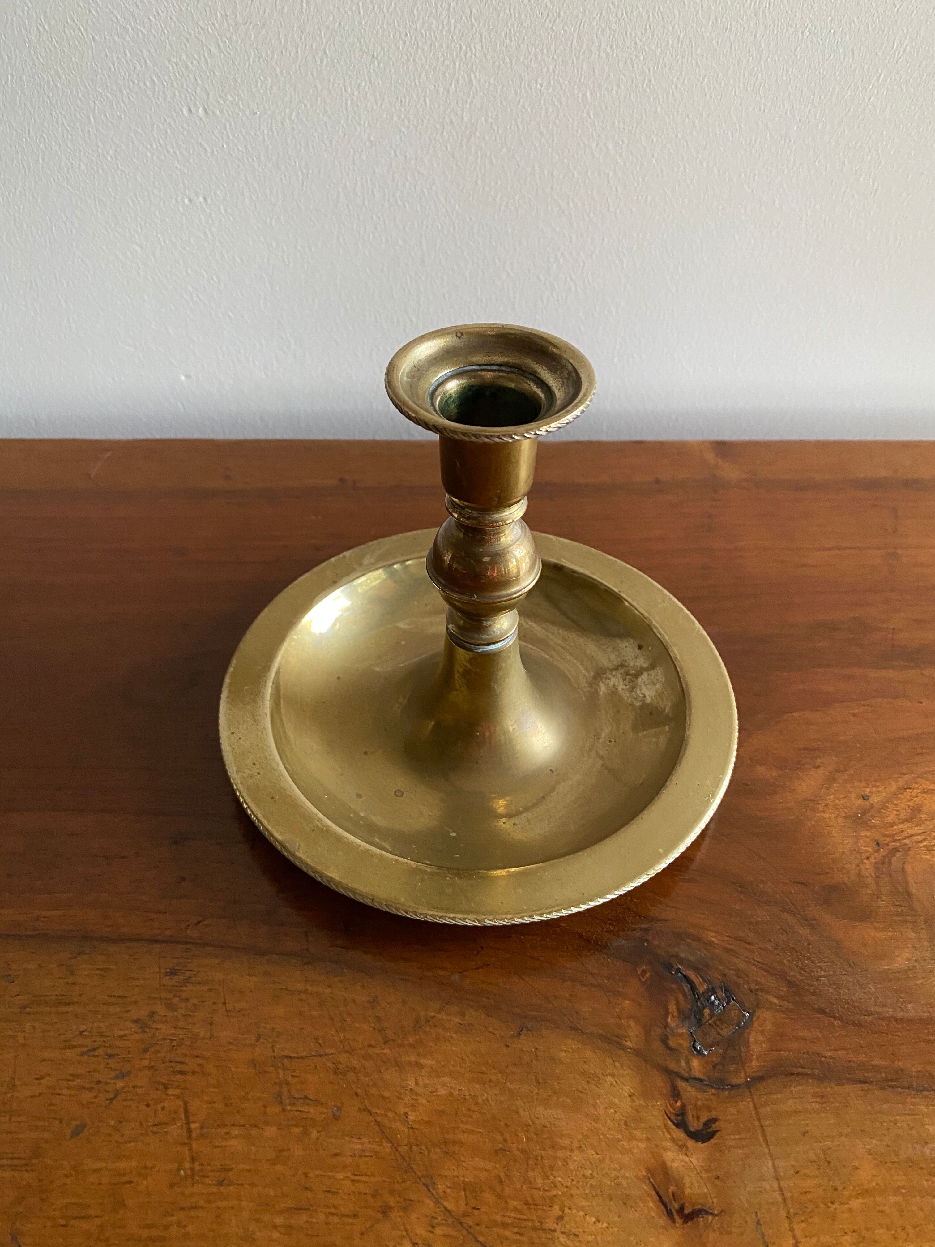 Antique brass candle holder