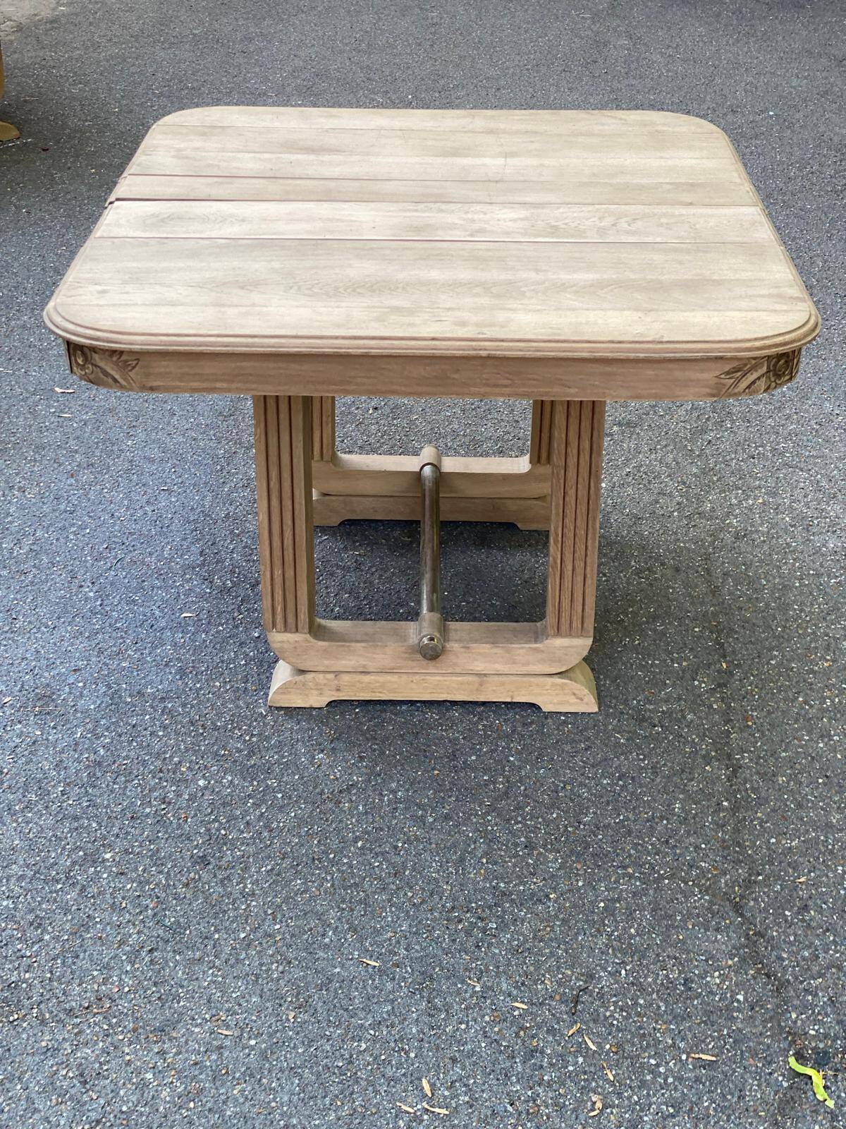 Rectangular Art Deco dining table with a central pedestal, stripped in solid oak.