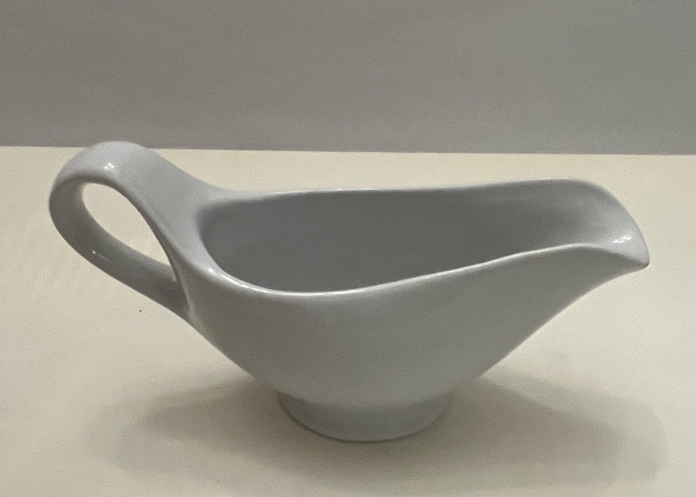 White earthenware saucière