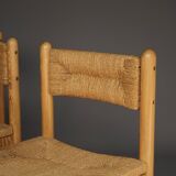 4 chaises de salle à manger en pin et jonc de mer dans le goût de Charlotte Perriand, années 1960