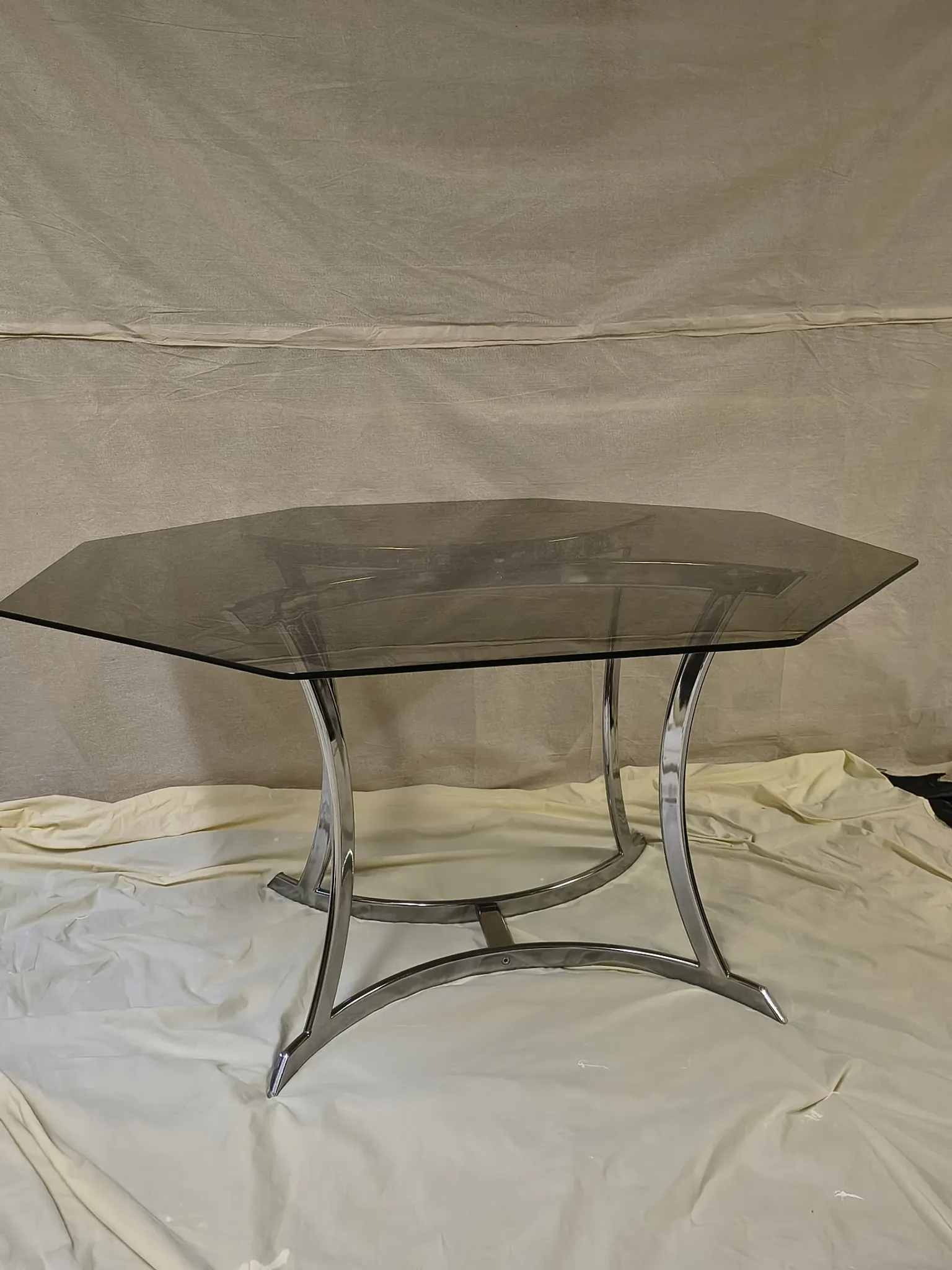 Smoked glass octagonal table from the early 1970s.