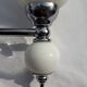 Pair of metal and 70's design opal glass wall light