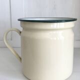 Old milk jug in enameled sheet metal