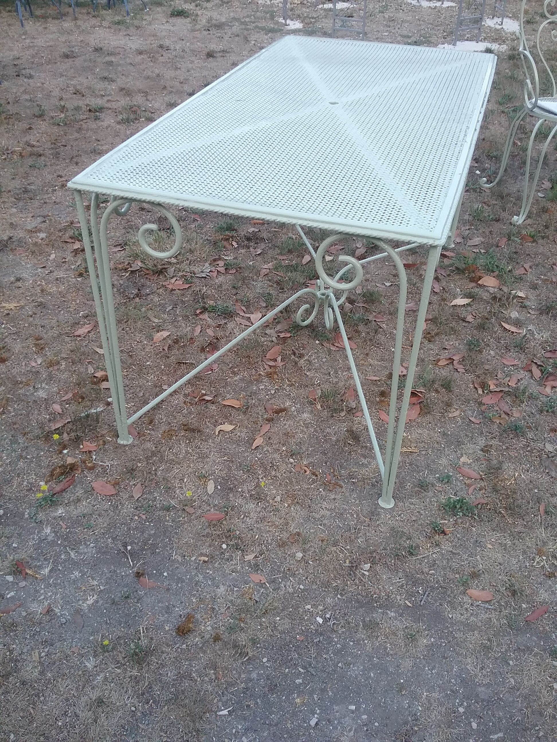 Garden furniture in green wrought iron