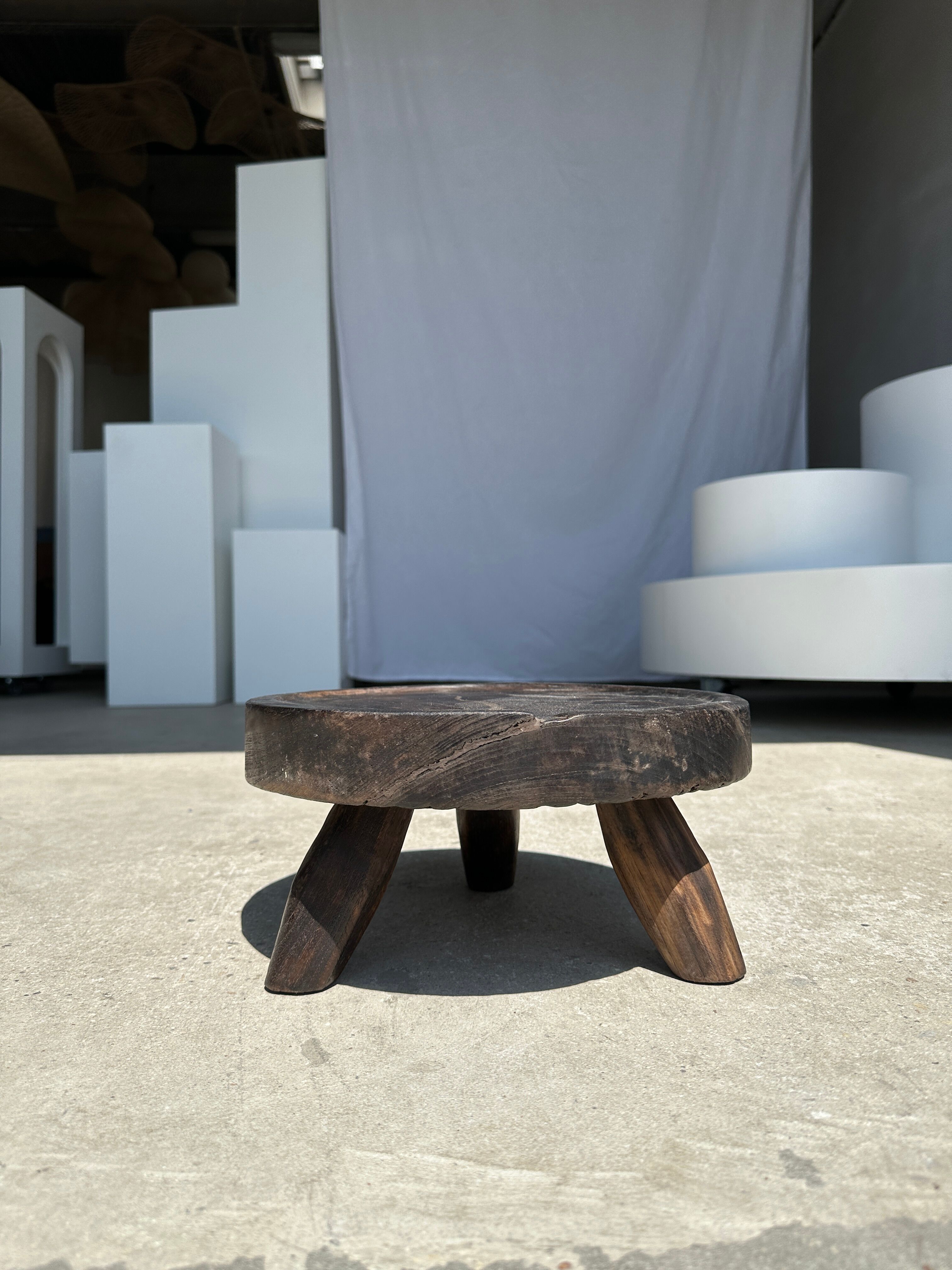 Small tripod stool low in dark brown upcycled teak