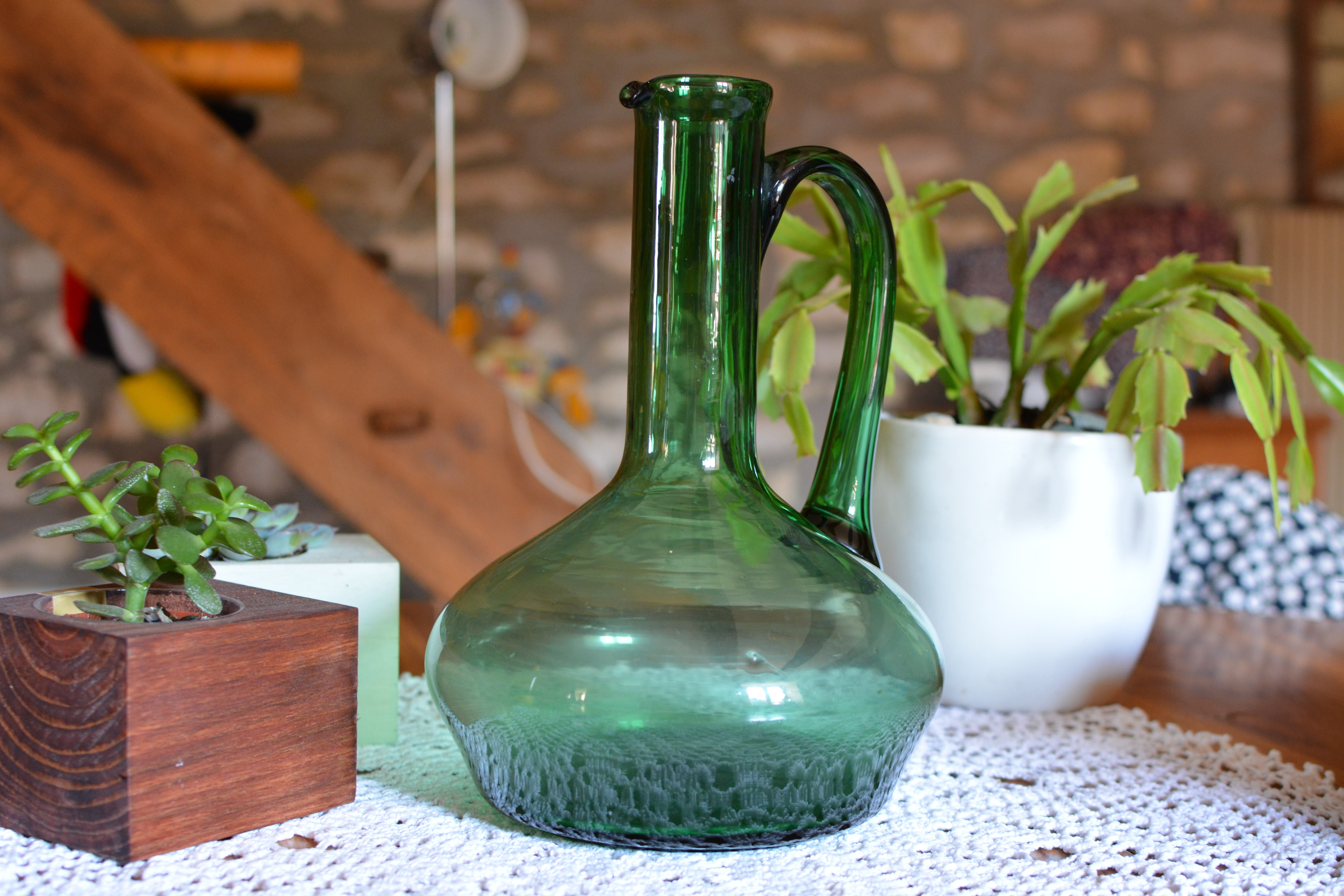 Blue green blown glass carafe