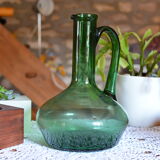 Blue green blown glass carafe