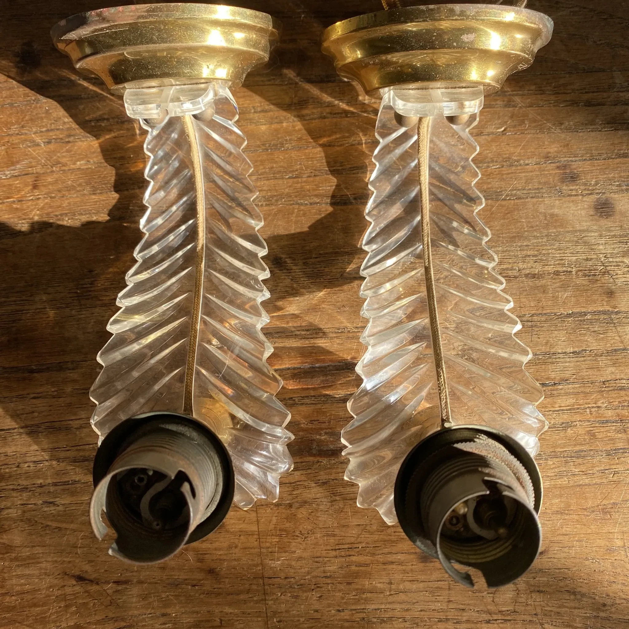 Vintage plexiglass wall lights in Hollywood Regency style from the 1960s.