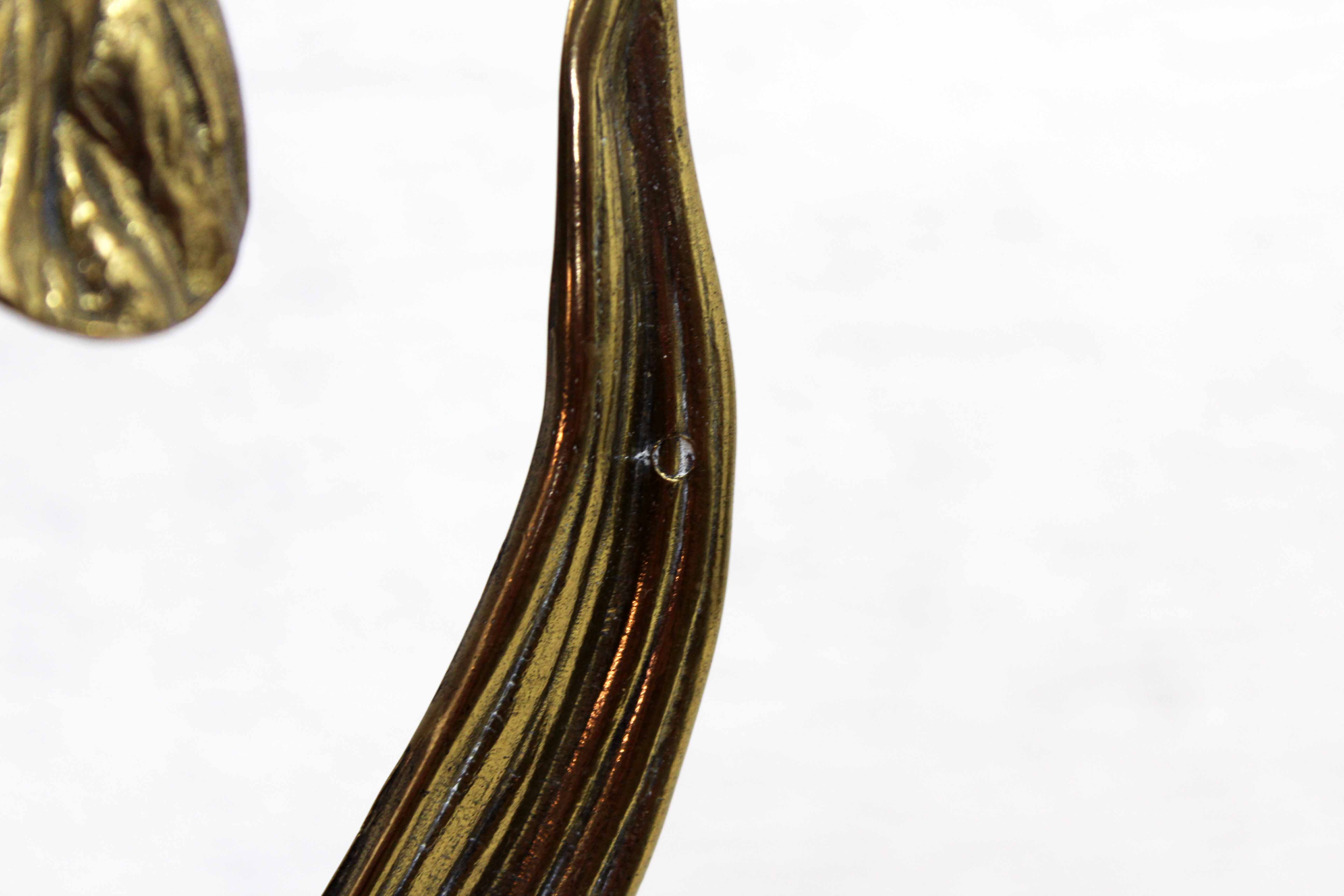 Art Nouveau brass flower candle holder