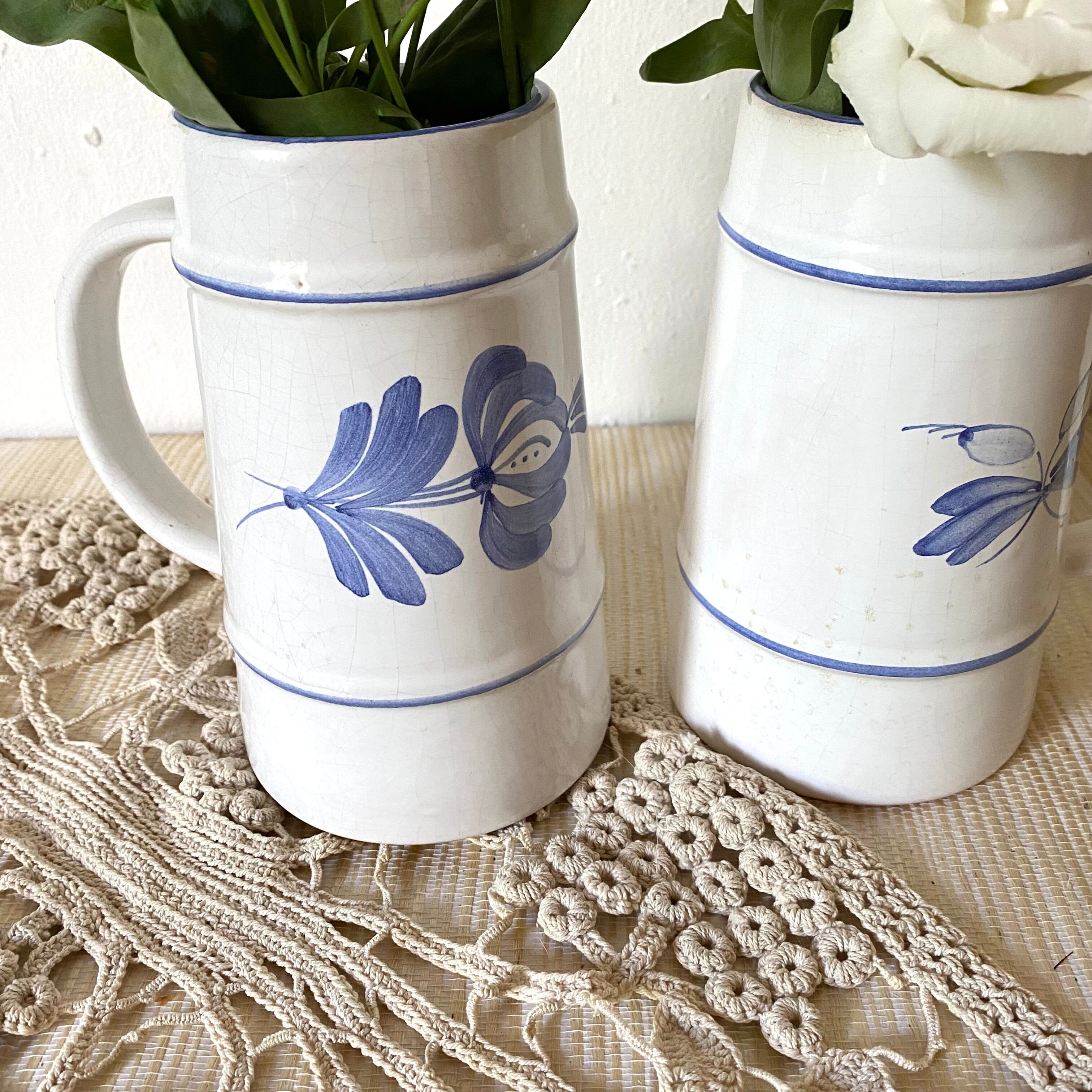 Flowery earthenware beer mugs