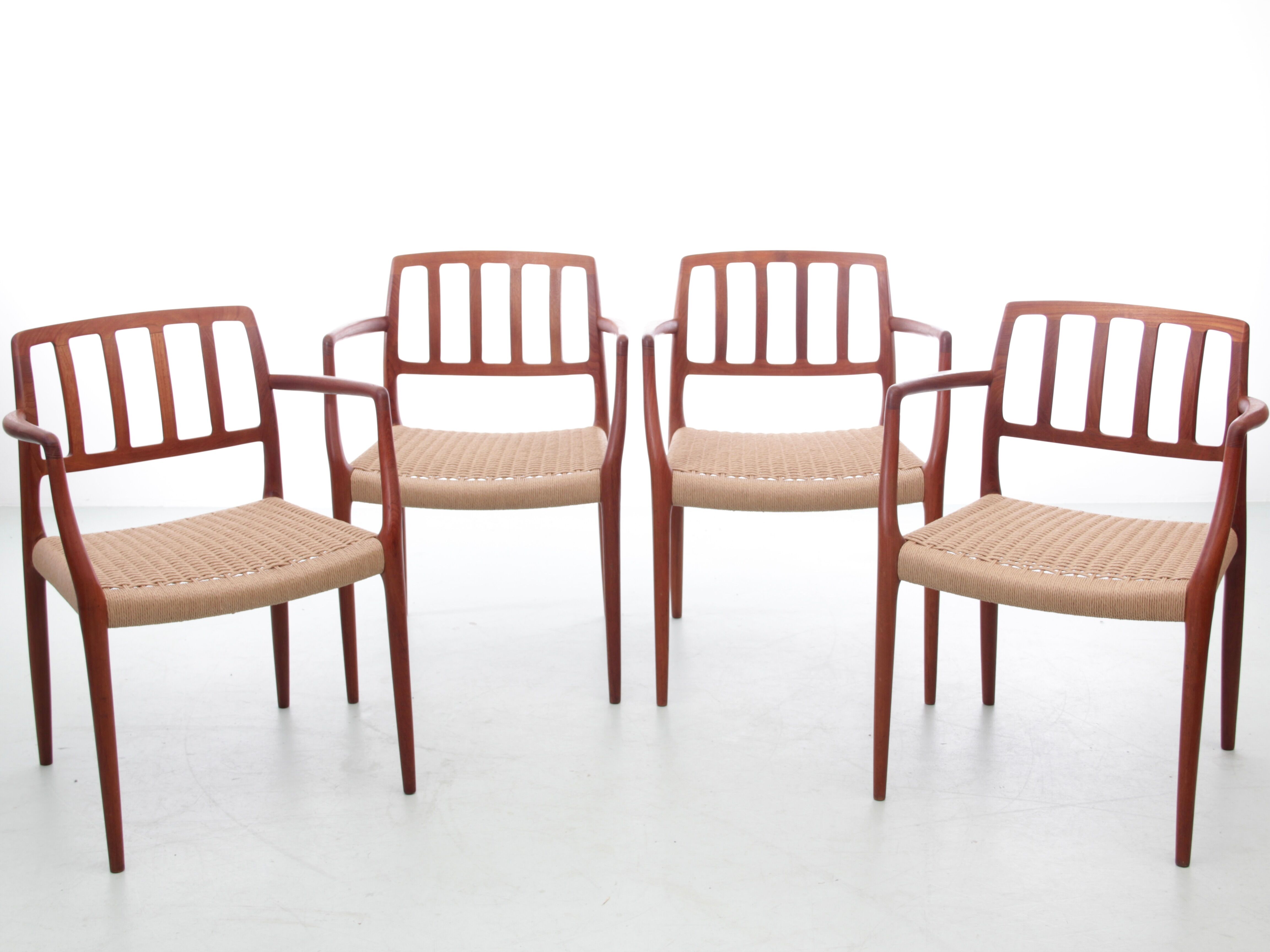 Suite of 4 Scandinavian teak armchairs model 66