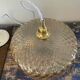 Gold-plated glass pendant light with diamonds