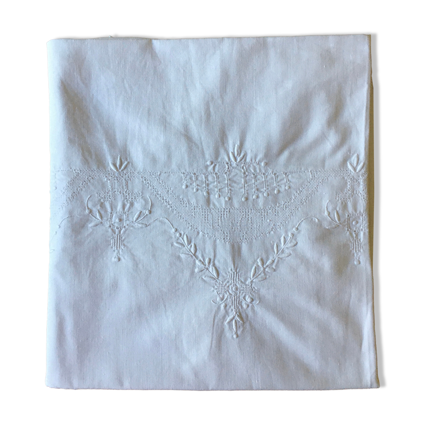 Old white tablecloth embroidered hand