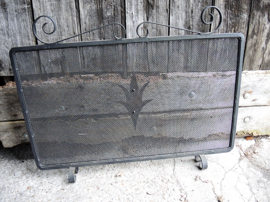 Old wrought iron chimney firewall