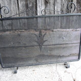 Old wrought iron chimney firewall