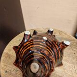 The shell-shaped trinket dish in Vallauris style.