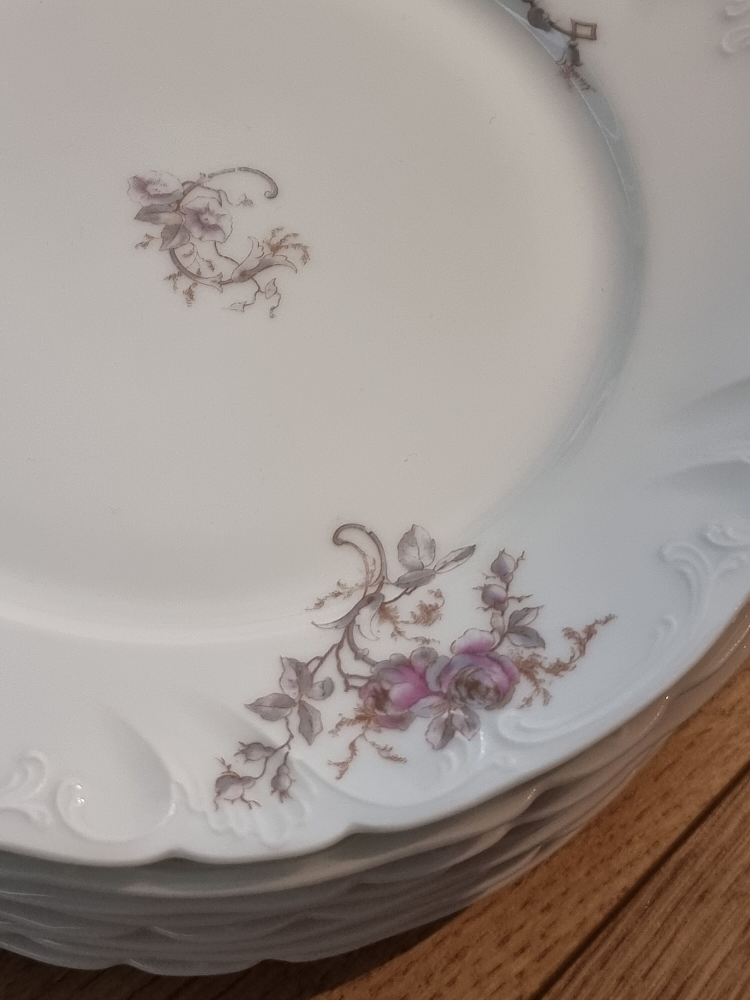 Set of eight Limoges porcelain plates