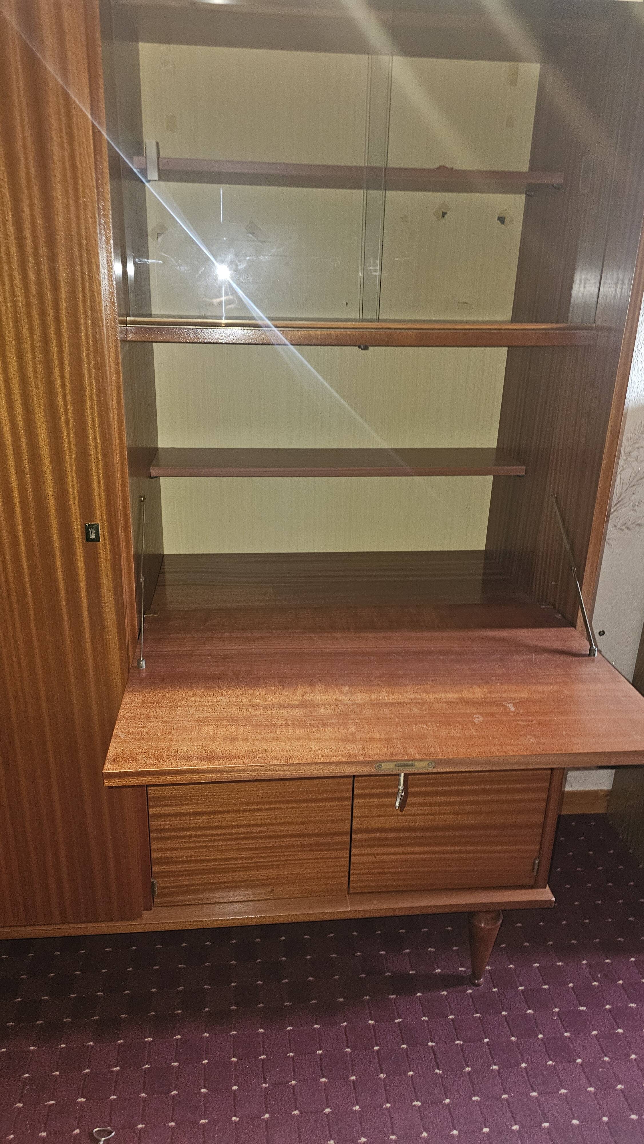 1960s teak veneer secretary with sliding display cabinet.
