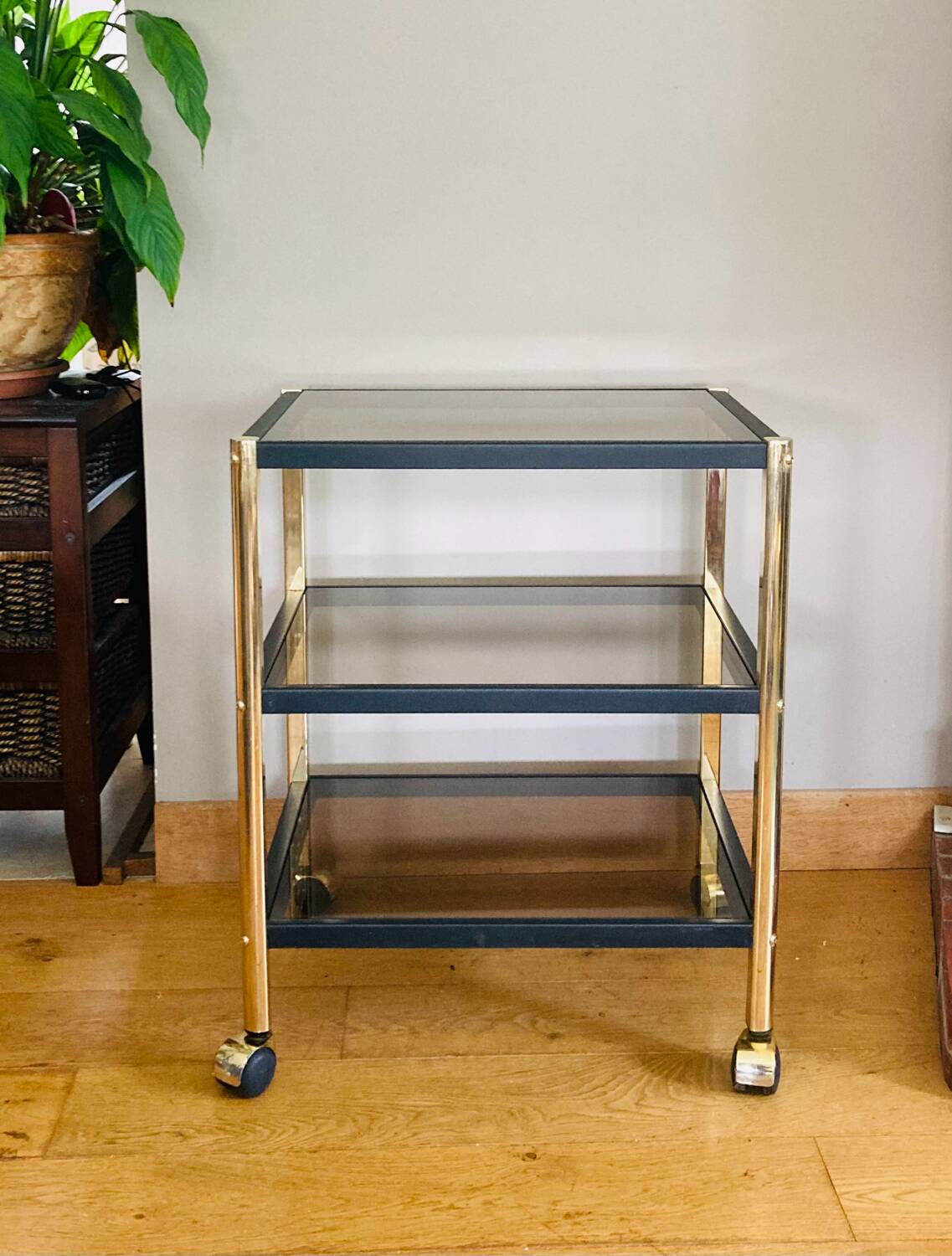 Side table in gold metal and smoked glasses 1970s