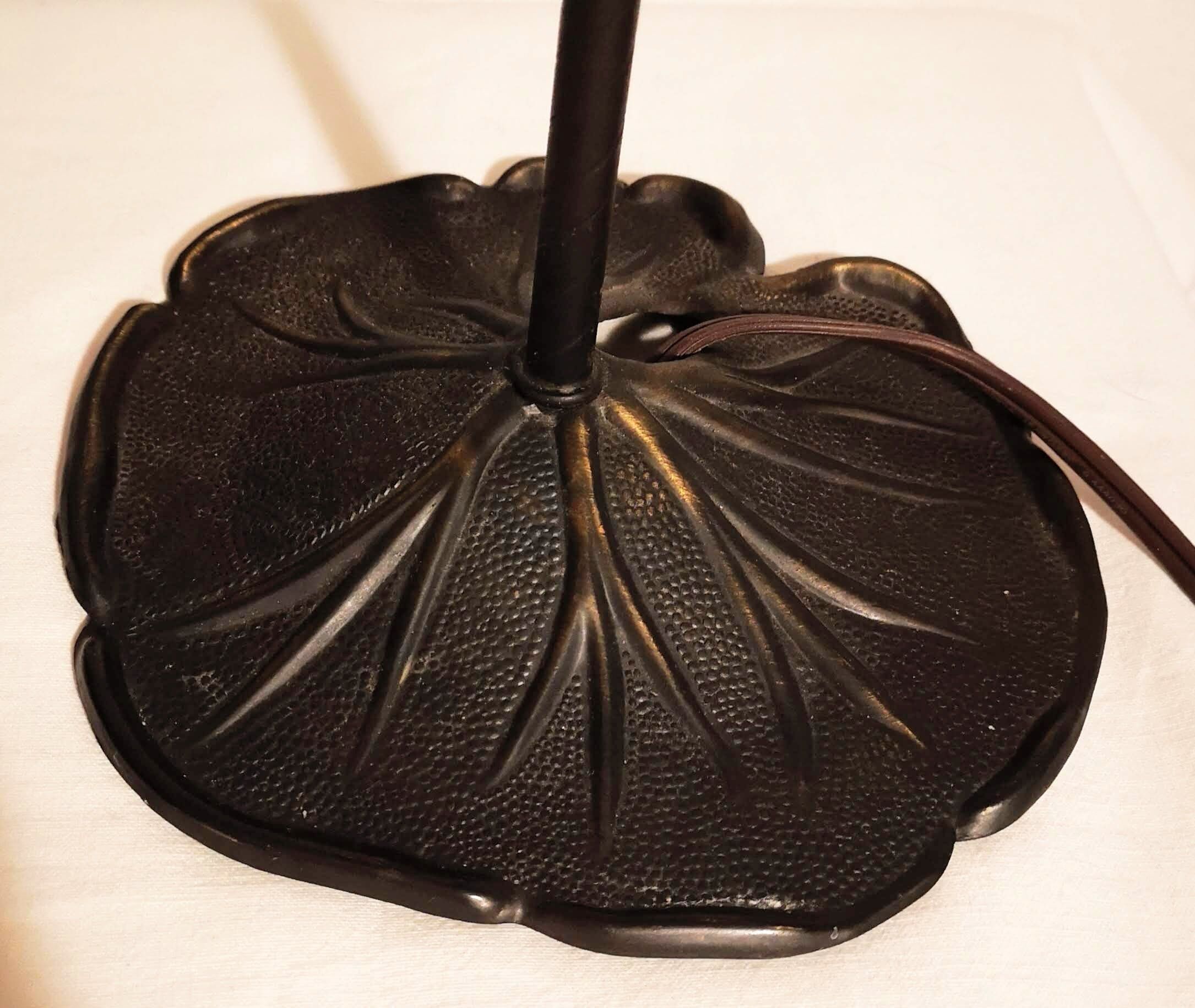 Aged metal and tulip glass