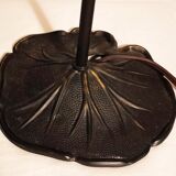 Aged metal and tulip glass