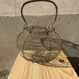 Vintage iron egg basket with hanse antique