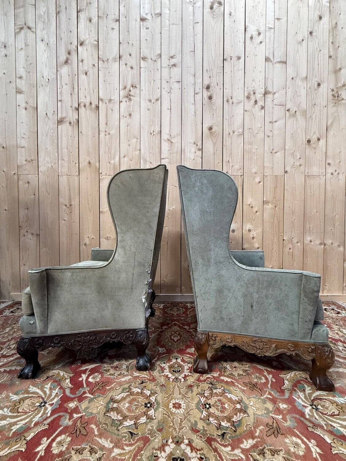Pair of wingback armchairs in George III style – Carved wood – 18th century.