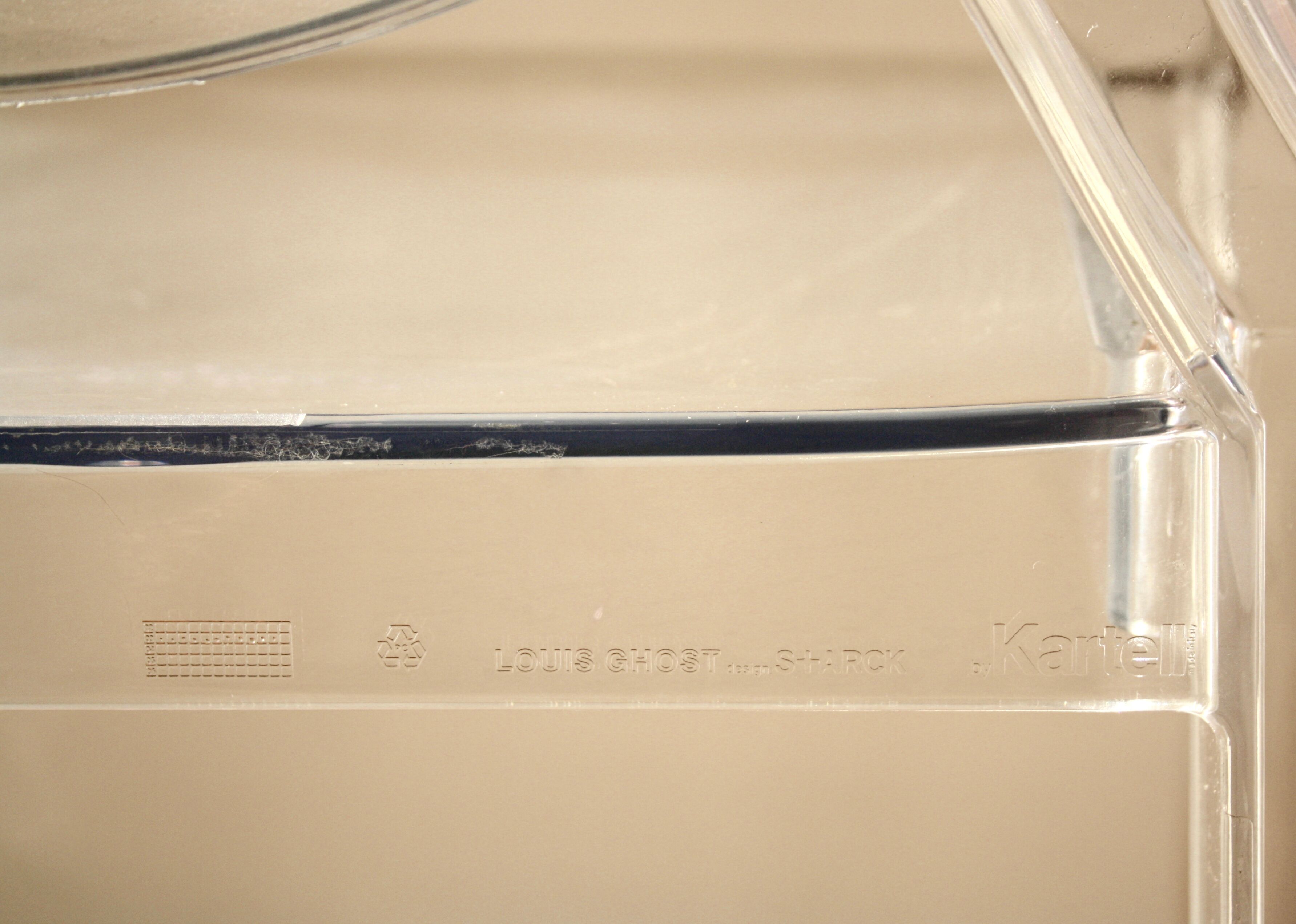 Two Starck chairs transparent model Louis Ghost