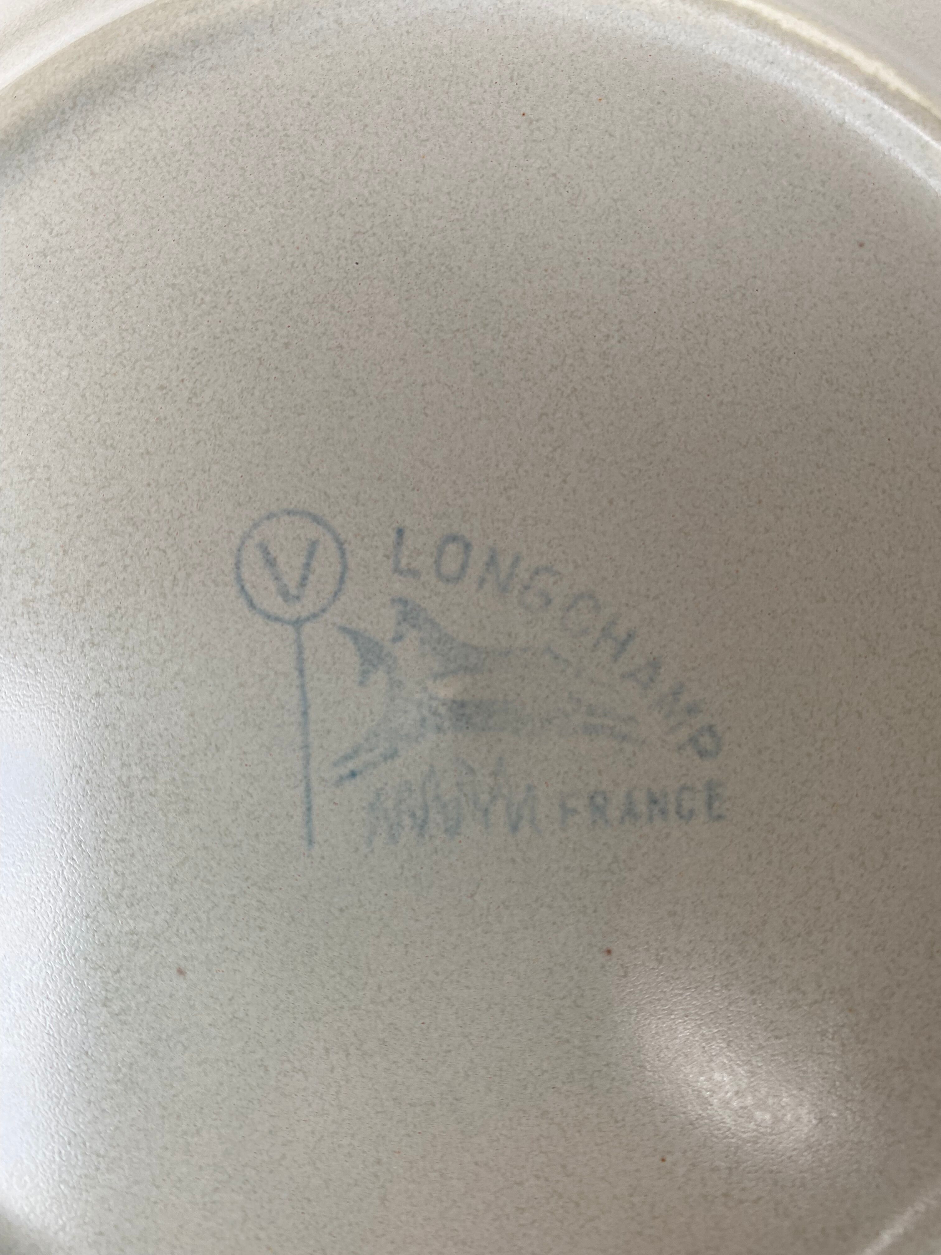 Vintage flat plates in Longchamp sandstone