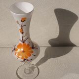 Flowered glass vase, orange flower on foot