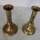 Pair of brass pusher candlesticks