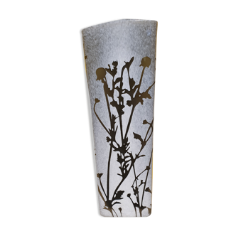 Old double gray glass vase with black foliage